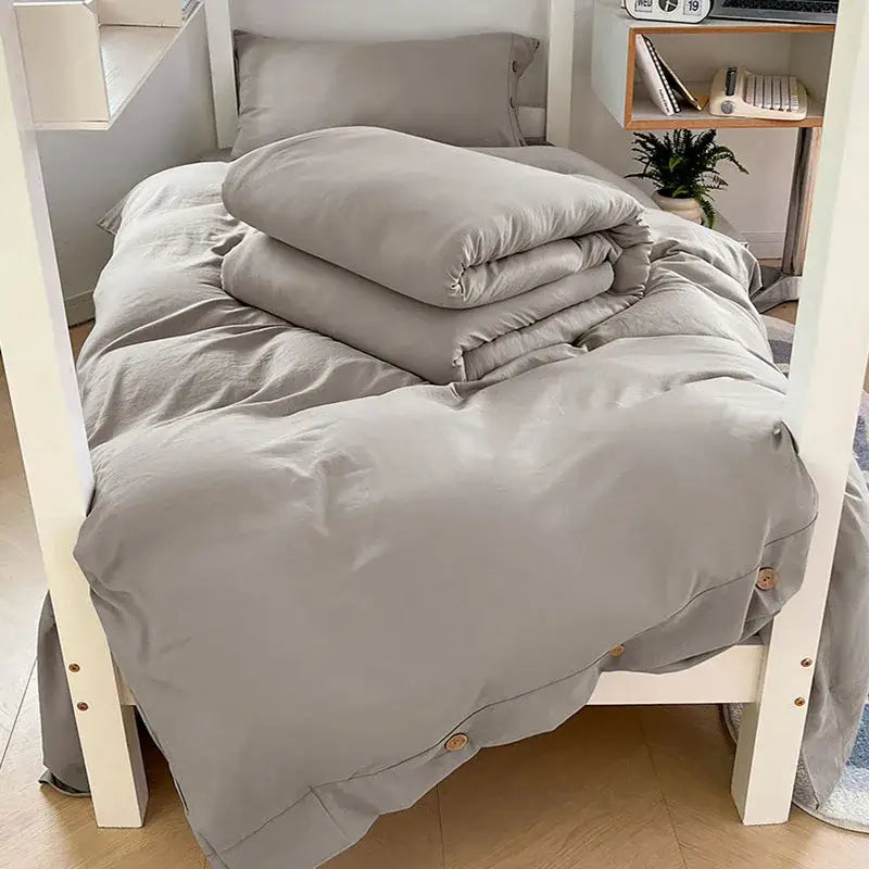 Minimalist gray quilted duvet set with wooden button closures made of decorbites buttoned washed cotton bedding set