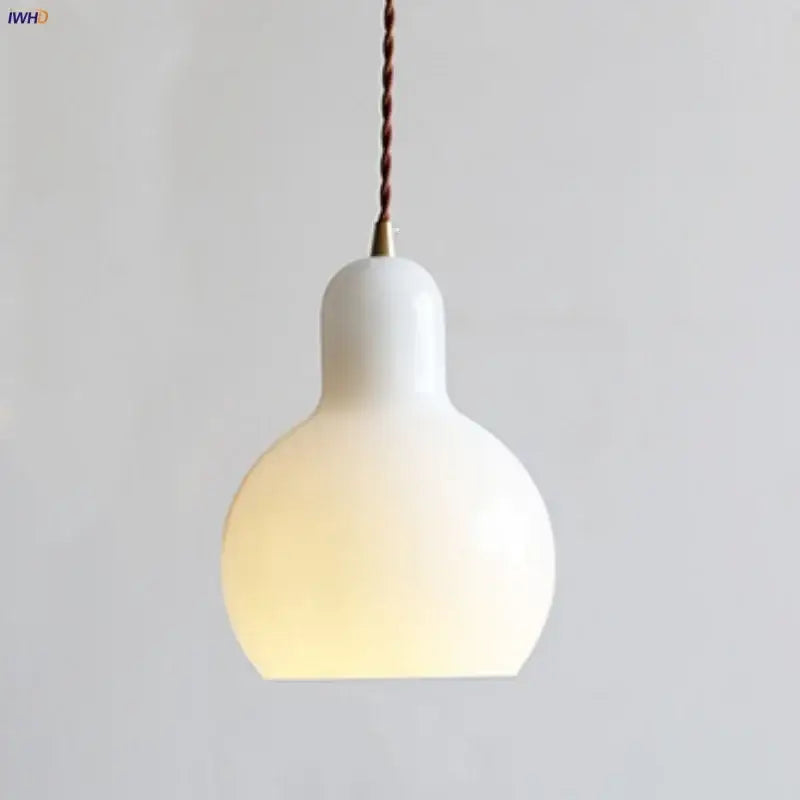 Minimalist white ceramic led pendant lamp with warm glow and twisted brown cord ideal for dining room lighting