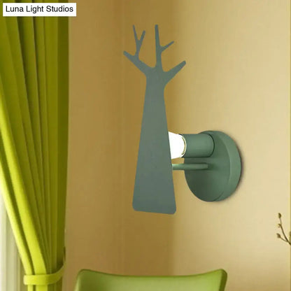 Minimalist white deer tree wall mount light bedroom sconce in sleek matte green grey silhouette with branching limbs
