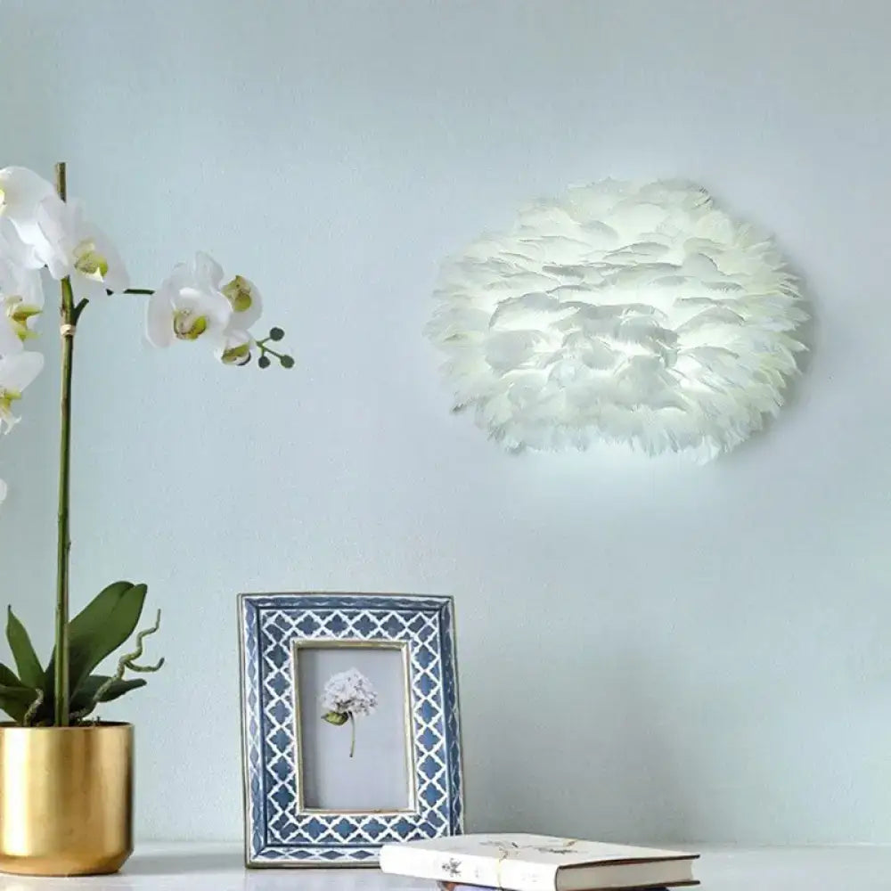 Minimalist white feather floral wall sconce with soft cloud-like design for bedroom lighting