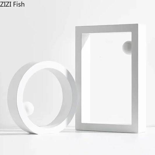 Minimalist white geometric circle desk ornament featuring a circular ring and rectangular frame with spherical elements
