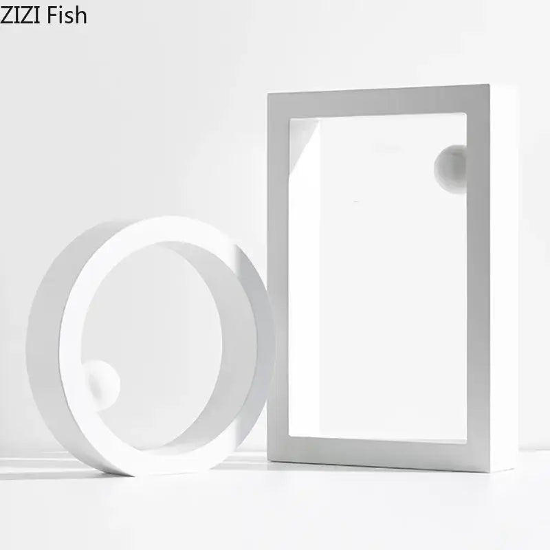 Minimalist white geometric circle desk ornament featuring a circular ring and rectangular frame with spherical elements