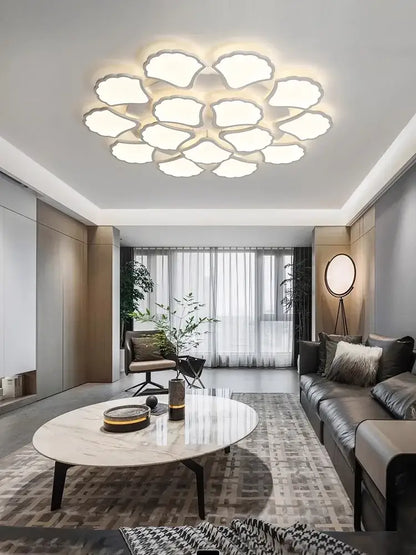 Minimalist white ginkgo biloba ceiling lamp with modern floral layered design for bedroom decor by decorbites