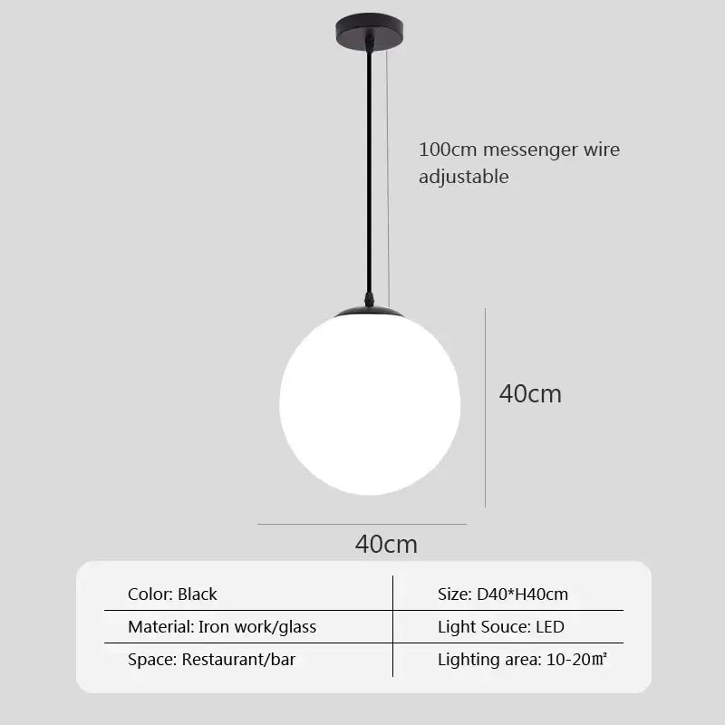 Black spherical pendant light with glass ball pendant and ironwork frame featuring led bulb for dining room decorbites