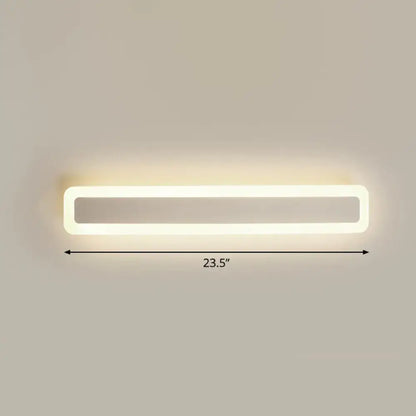 Minimalist white led vanity light wall sconce with a sleek frame and warm third gear diffused lighting for bathrooms