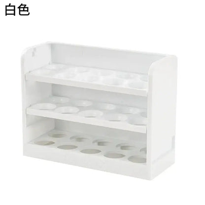 Minimalist white plastic three-tiered egg storage rack with circular indentations for organized egg storage