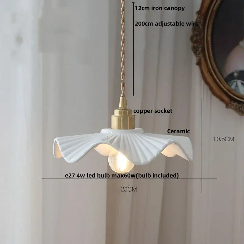 Minimalist white ceramic pendant light with fluted petal design and brass accents for dining room decorbites ceramic led