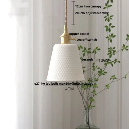 Minimalist white ceramic pendant light with textured diamond pattern and brass finish for dining room home decor by decorbites ceramic led