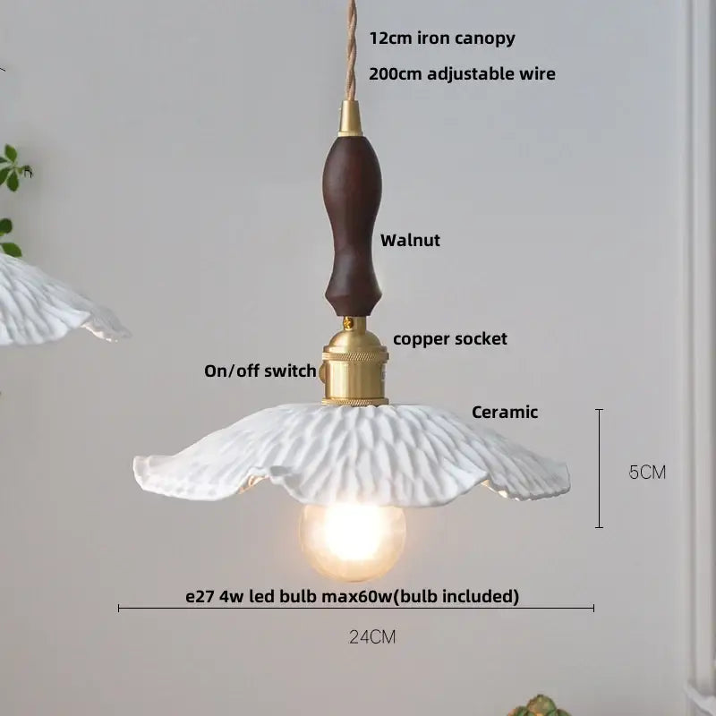 Minimalist white pleated ceramic pendant light with dark walnut handle and brass accents for dining room home decor decorbites ceramic led