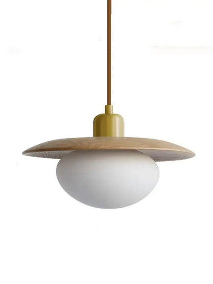 Modern pendant lights with warm brass rod, wooden disc shade, and frosted glass globe for dining room decorbites cream wind
