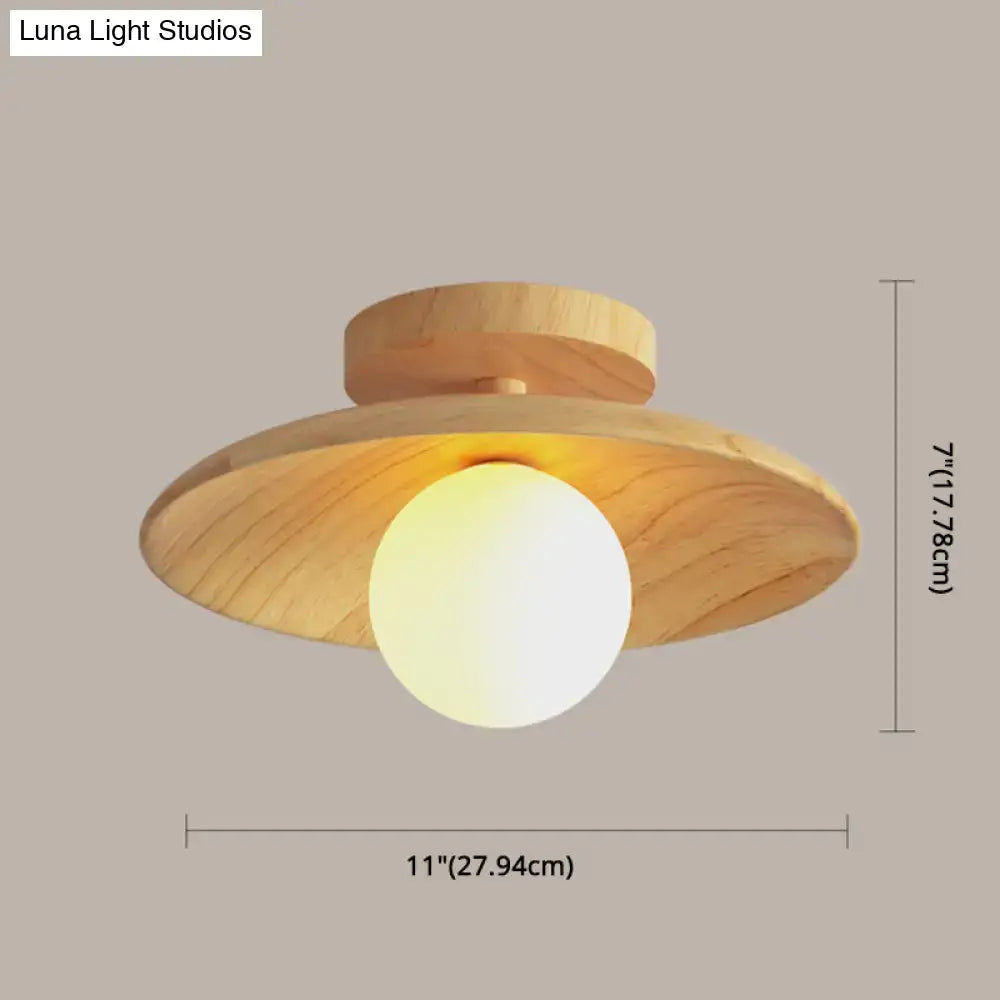 DecorBites™ sleek wooden ceiling light semi-flush mount with a warm glowing bulb and flat disc-shaped wood shade canopy width