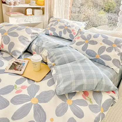 Blue and white floral print cotton bedding set with soft textured fabric in a mint and cream bedroom duvet cover