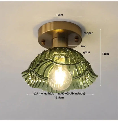 Vintage-style ceiling light with brass-finished copper iron mount and olive-green textured blue flower glass shade