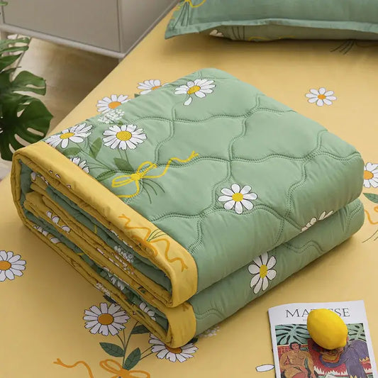 Mint green daisy print quilt set with yellow trim and diamond quilted texture for cozy bedroom decorbites daisy print