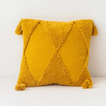 Vibrant mustard-yellow diamond tassel cushion cover with plush tassels and textured design for living room decor