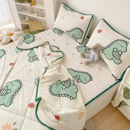 Mint green dinosaur summer quilt and latex fitted sheet set with soft textured surface and teal piping accents
