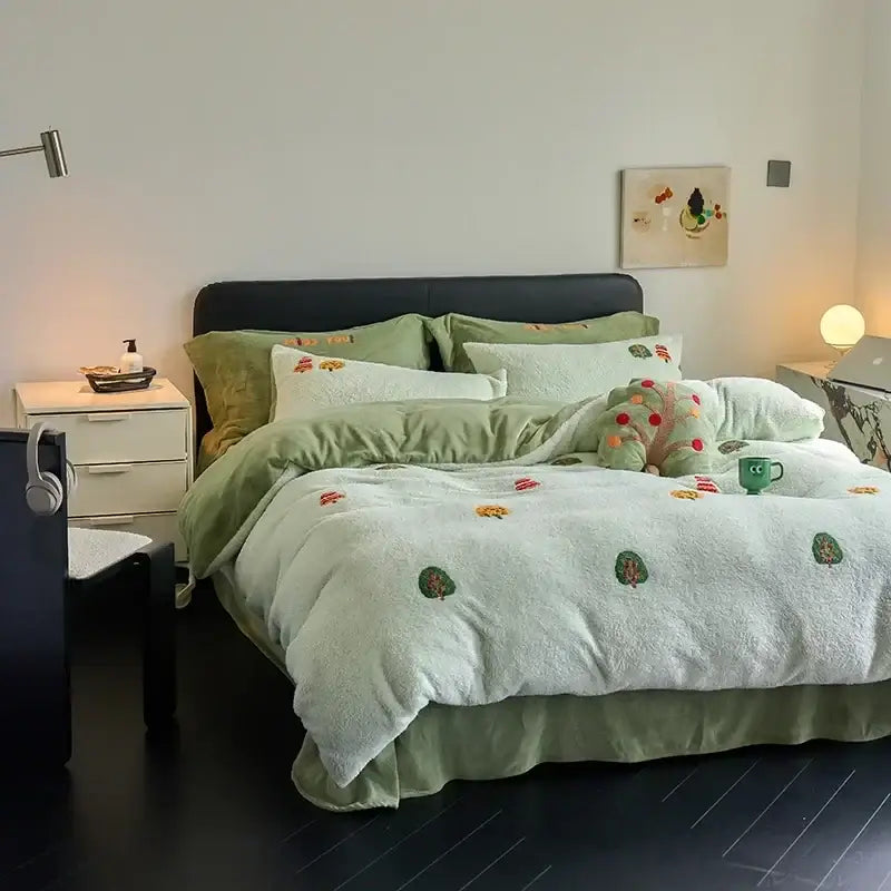 Soft mint green plush duvet set with embroidered tree and fruit motifs in matte ant velvet material