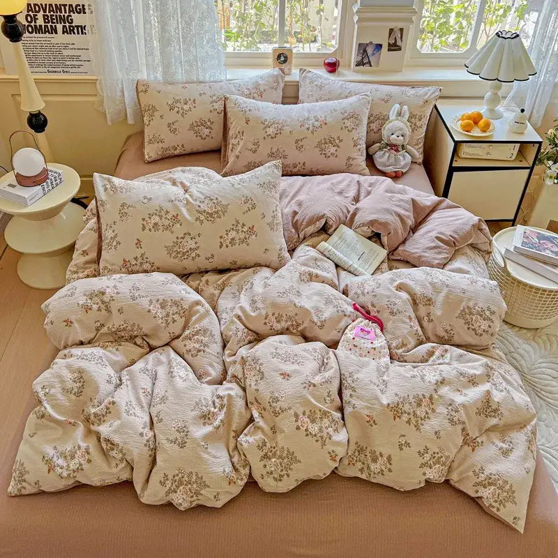 Floral-patterned beige duvet cover set with soft textured fabric and matching pillows for bedroom use