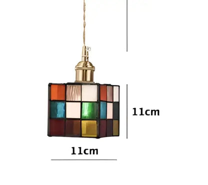 A colorful square stained glass pendant led wall lamp sconce with brass finish suitable for bedroom lighting