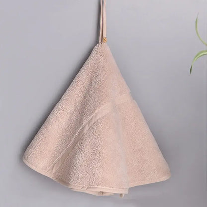 A blush terry cloth baby towel with fabric loop and wooden button in mint green and off-white decorbites coral velvet hand towel set