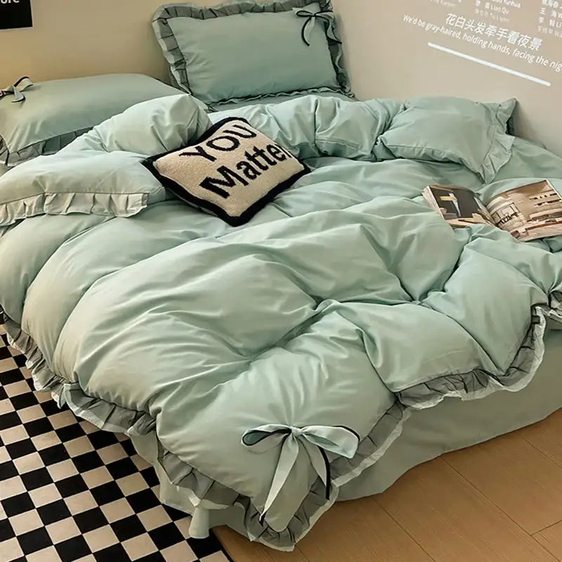 Mint green ruffled cotton embroidery bedding set with matching pillows and you matter throw pillow for bedroom decorbites