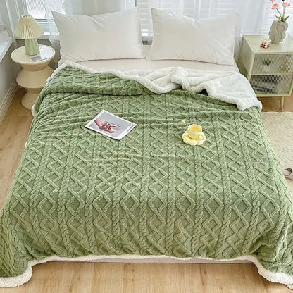 A cozy olive green decorbites coral fleece blanket with textured diamond pattern and soft white sherpa lining