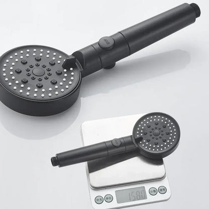 Modern black matte-finish 5-function shower head with multiple spray nozzles and textured grip handle for bathrooms