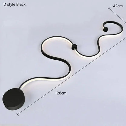 Modern abstract black iron body wall lamp with sleek curved design and illuminated white light strip for bedroom decorbites iron body