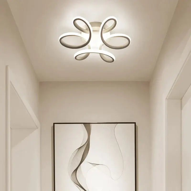 Modern abstract black and white decorbites led ceiling light with sleek curved acrylic rings for kitchens ceiling light