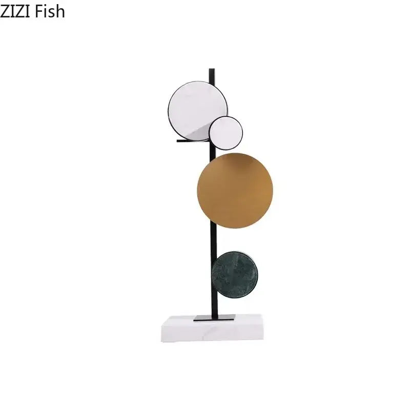 Modern abstract circular marble sculpture with white gold and dark green discs on black metal rod for decorbites circular decor