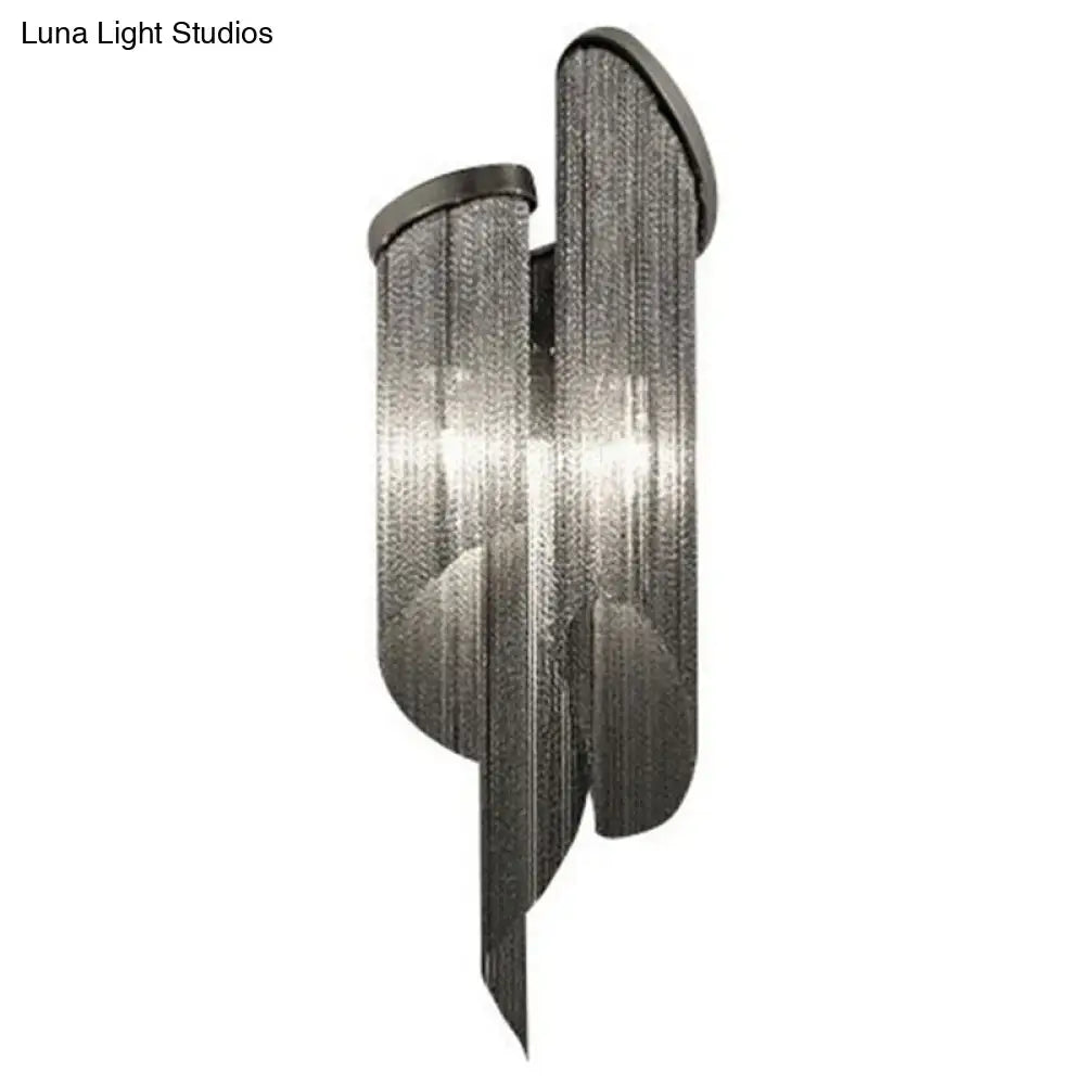 Modern black metal wall light with tassel aluminum shade featuring cascading chain-like strands for living room decor