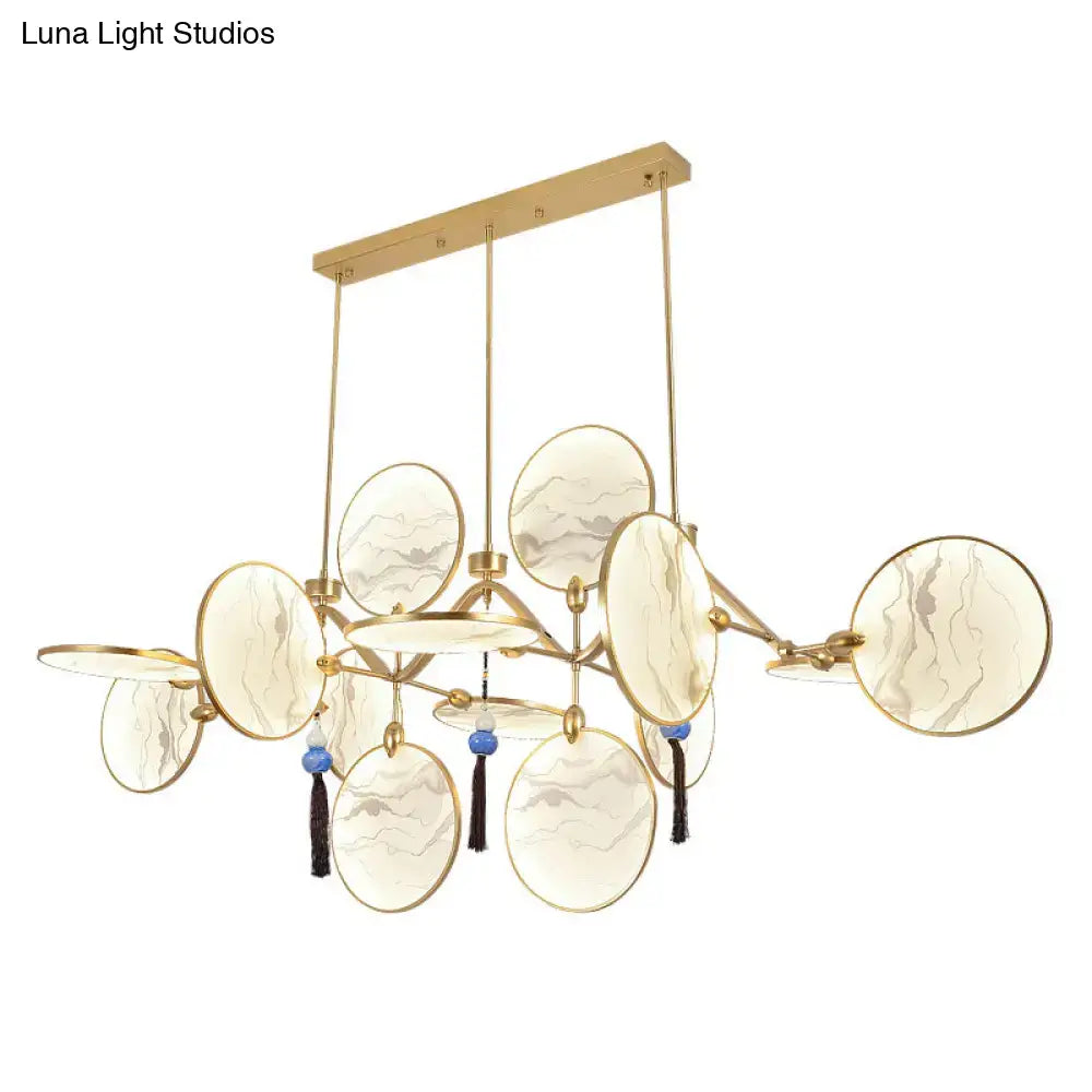 Gold-toned DecorBites™ circular fan island lamp with modern acrylic led discs, blue beads, and black tassels for tearooms