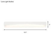 Modern acrylic rectangular vanity light fixture with a sleek white diffuser and clean lines for bathroom use