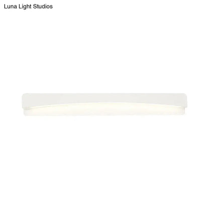A sleek white acrylic rectangular vanity light fixture with soft diffused illumination for modern bathroom use