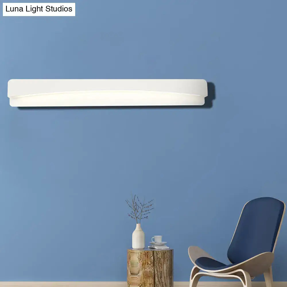 Modern white acrylic rectangular vanity light fixture with a sleek minimalist design for bathroom use
