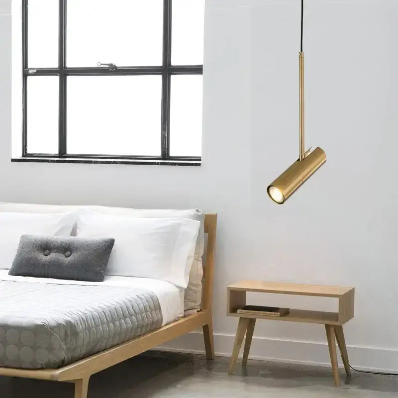 A sleek gold-finished pendant light with modern design and adjustable gu10 finish options works beautifully in kitchens