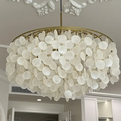 Elegant white aeolian bells shell chandelier with gold-toned circular frame for modern living room decorbites pendant light