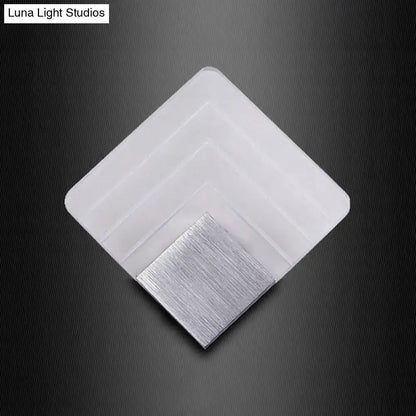 Modern aged silver and black square led wall sconce with brushed silver metallic accent for bedroom lighting