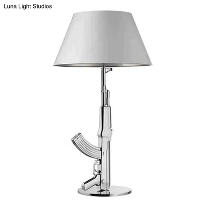 Modern ak47 gun lounge floor lamp with chrome finish and white conical shade for gold and black bedroom light