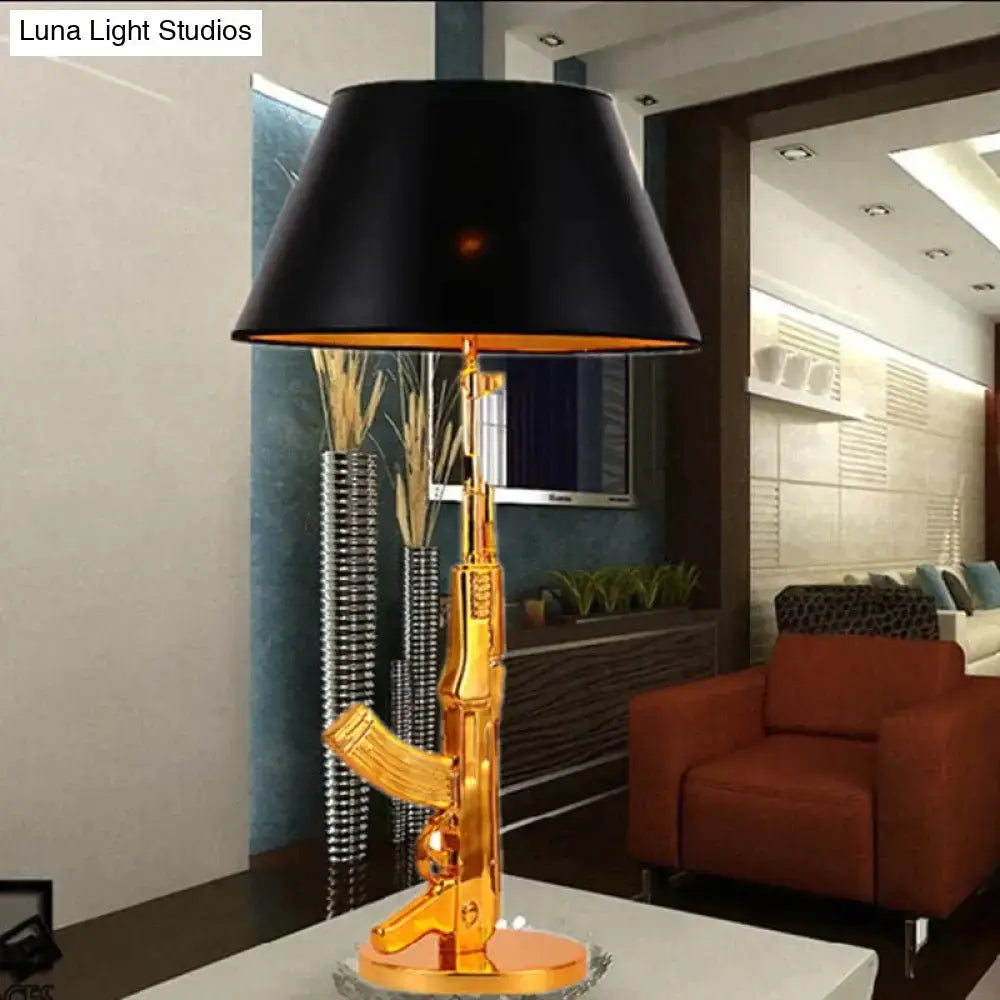 Modern ak47 gun lounge floor lamp in gold with silvery gold lustre and black shade for bedroom lighting