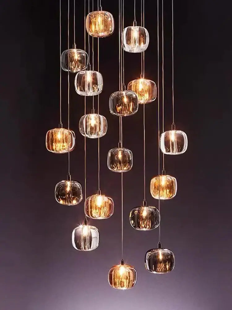 A modern amber and gold crystal led ceiling chandelier with hanging textured glass orbs for living room decorbites crystal led