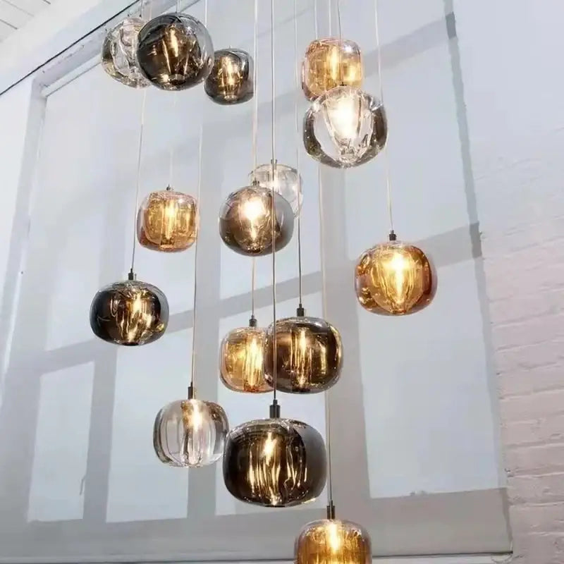 Modern amber and gold crystal led chandelier staircase pendant light with spherical glass shades by decorbites crystal led