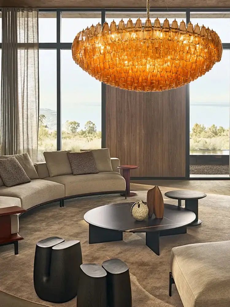 Modern amber and gray glass chandelier with textured honeycomb design for luxury dining room decorbites colorful gray lighting
