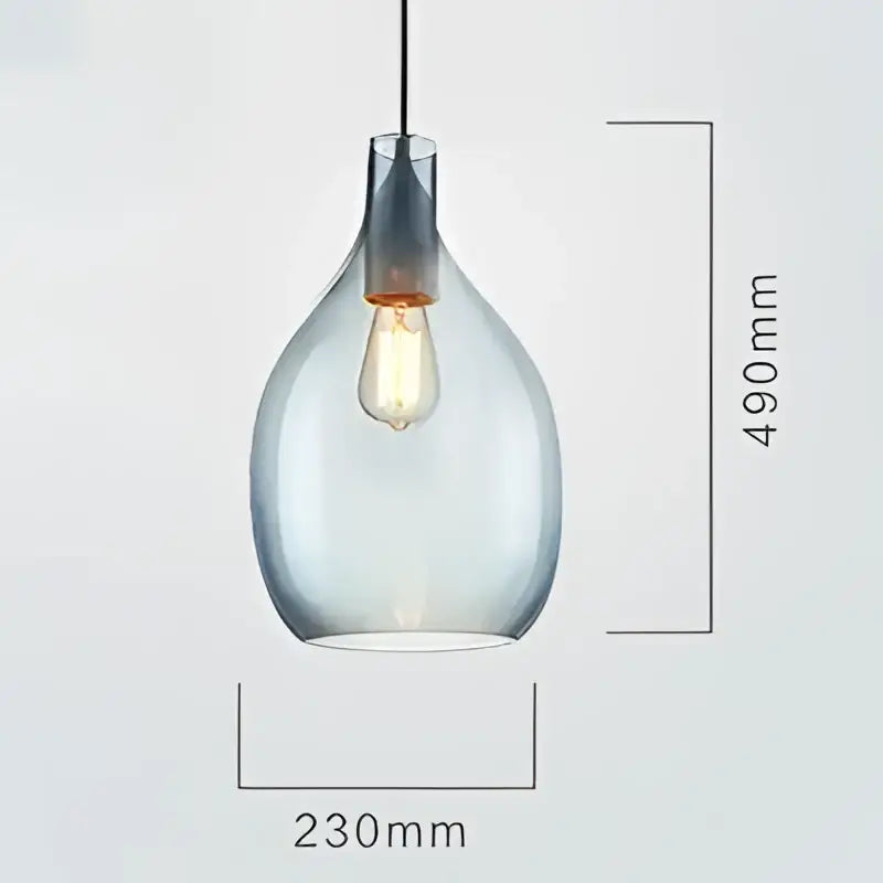 A sleek amber and blue glass pendant light with a frosted finish and exposed Edison bulb for modern kitchens