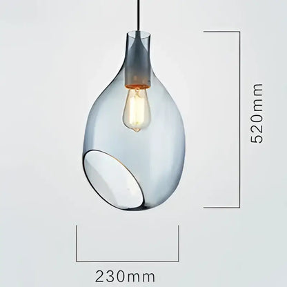 Modern amber and blue glass pendant lights featuring sleek teardrop-shaped frosted glass pendant with edison bulb