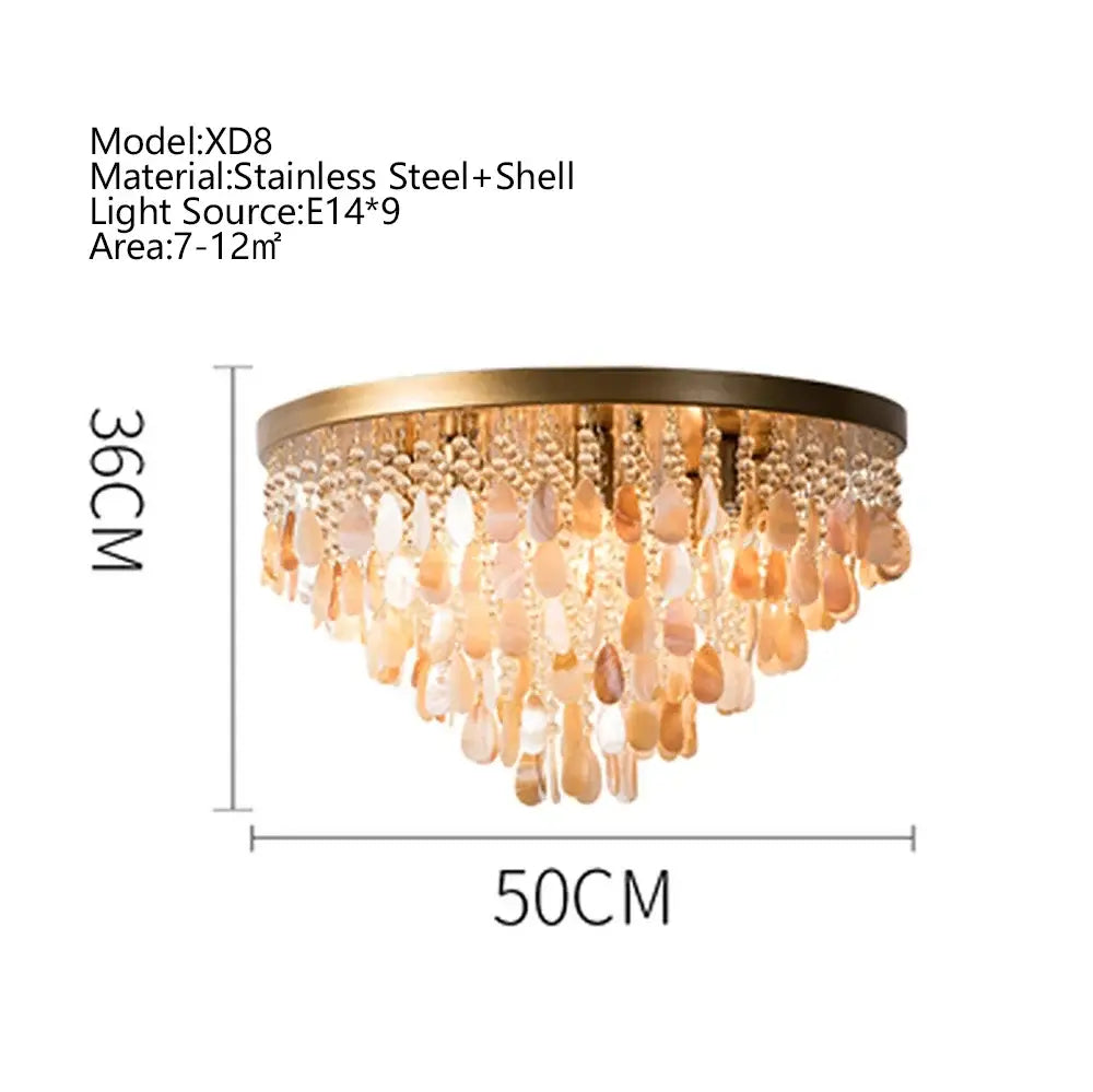 Modern amber and clear crystal led ceiling lamp with gold-toned stainless steel and teardrop shell pendants for decorbites crystal led