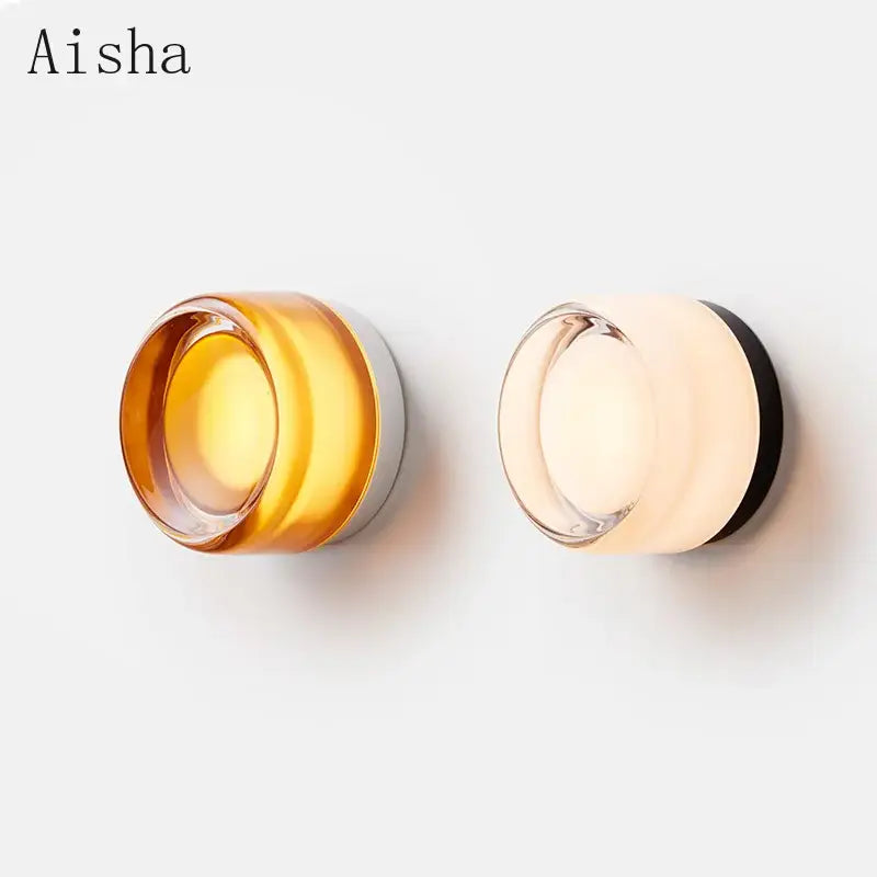 Aisha modern wall lamp with translucent amber and frosted acrylic sconce led shades and sleek metallic bases