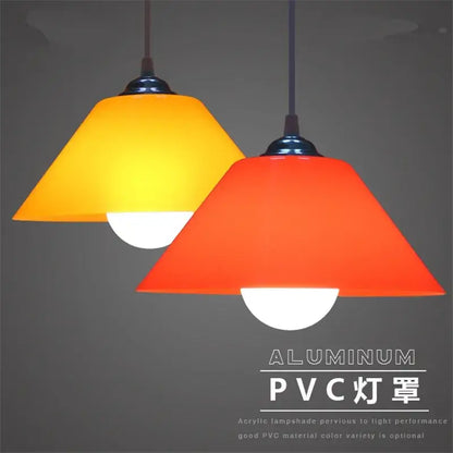 Modern amber glass pendant light with iron finish and vibrant orange pvc plastic shades for dining room illumination
