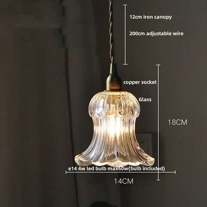 Modern amber glass ball led pendant light with clear fluted glass, copper socket, and twisted iron canopy for dining room
