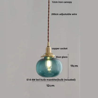 Modern amber glass ball pendant light featuring a round blue glass ball led with copper socket for dining room lighting